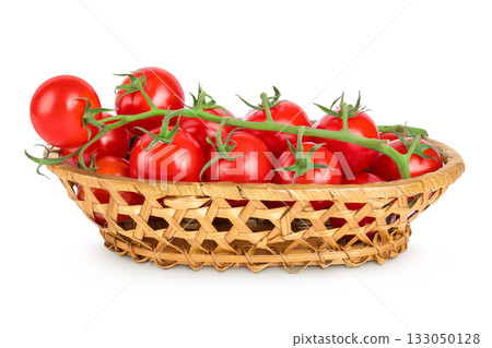 Cherry tomato bunch in a wicker basket isolated on white background 133050128