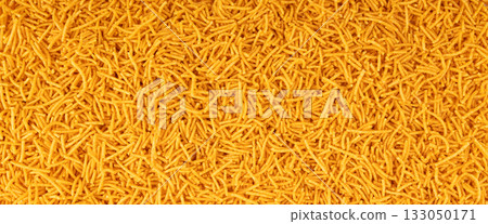 Aloo bhujia indian snack isolated. Crispy potato and chickpea flour strips, alu bhujiya sev Aloo bhujia indian snack isolated. Crispy potato and chickpea flour strips, alu bhujiya sev 133050171