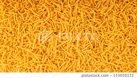 Aloo bhujia indian snack isolated. Crispy potato and chickpea flour strips, alu bhujiya sev 133050172