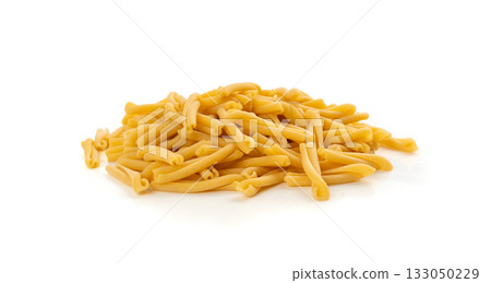 Casarecce pasta isolated, dry traditional macaroni, raw casarecce, wheat noodles, Italy cuisine ingredient Casarecce pasta isolated, dry traditional macaroni, raw casarecce, wheat noodles, Italy cuisine ingredient 133050229