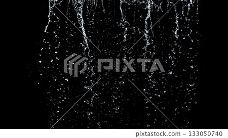 Freeze Motion Shot of Water Stream Isolated on Black Background 133050740