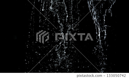 Freeze Motion Shot of Water Stream Isolated on Black Background 133050742