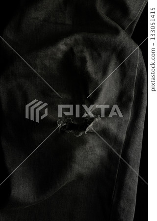 Damaged black jeans with holes Damaged black jeans with holes 133051415