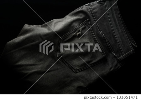 Black jeans with holes in the pockets 133051471