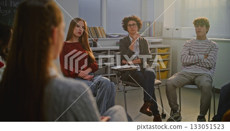 Teacher and Students Engage in Group Therapy inspired Discussion About Emotions and Stress Teacher and Students Engage in Group Therapy inspired Discussion About Emotions and Stress 133051523