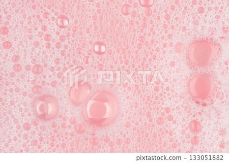 white soapy water on a pink background white soapy water on a pink background 133051882