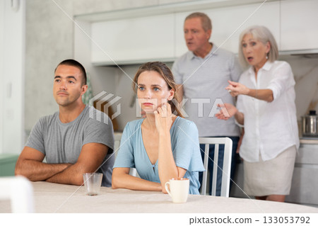 Old couple quarrel with young couple 133053792