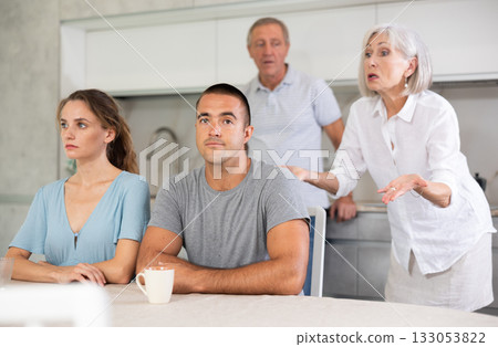Old couple quarrel with young couple 133053822