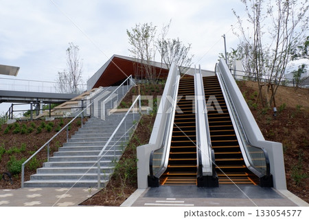 Outdoor escalator in a shopping mall 133054577