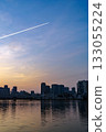 Osaka Yodogawa riverbank and buildings at dawn 133055224