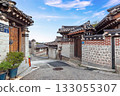 Korean traditional Hanok street with unique brick walls under a bright blue sky at this famous cultural landmark 133055307