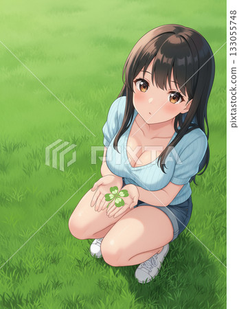 A woman crouching on the grass and offering a four-leaf clover 133055748