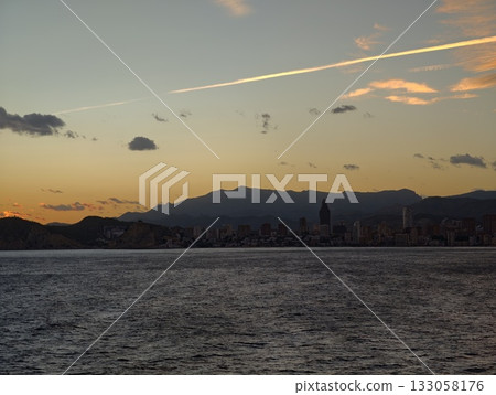 relaxing seaside landscape with pastel shades and tranquil waves perfect for calming backgrounds relaxing seaside landscape with pastel shades and tranquil waves perfect for calming backgrounds 133058176