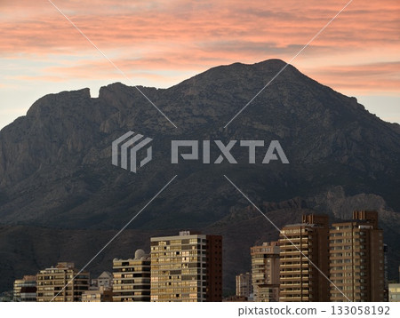 colorful cityscape imagery, dreamlike scene combining city architecture with tranquil natural 133058192