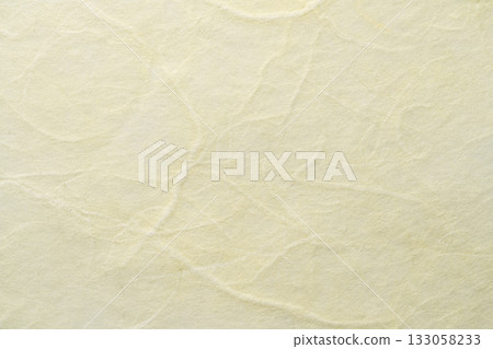 Light yellow cloud dragon dyed Japanese paper texture background 133058233