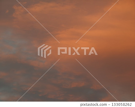 gentle twilight with gentle hues, calm dusk with muted color transitions and hazy cloud layers 133058262