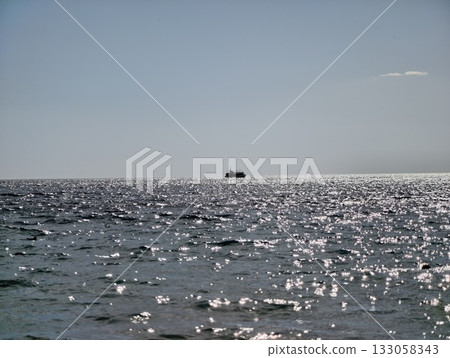 tranquil ocean view with fading horizon, peaceful maritime portrayal under soft sky illumination tranquil ocean view with fading horizon, peaceful maritime portrayal under soft sky illumination 133058343