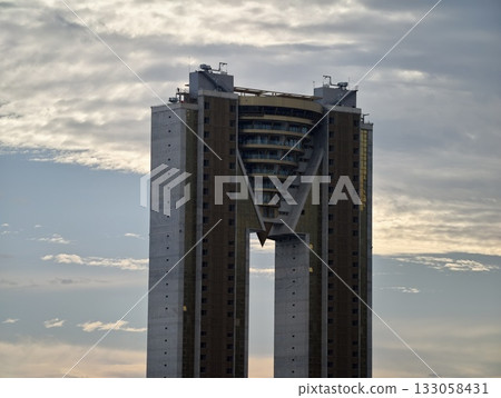 urban skyline focal point showcasing bold geometric shapes and dramatic natural lighting effects 133058431