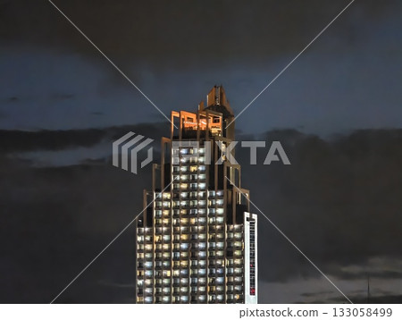 nighttime city skyline showcases lit communications tower with bustling media and control centers nighttime city skyline showcases lit communications tower with bustling media and control centers 133058499