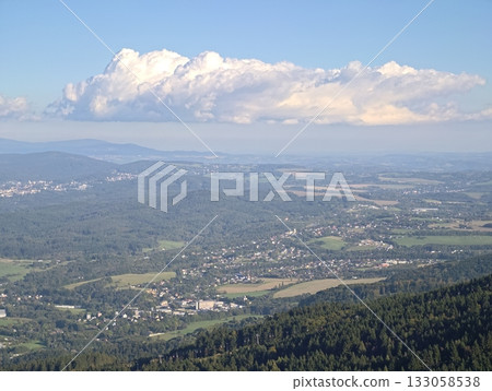 comprehensive aerial depiction of extensive valley settlement with natural and manmade elements 133058538