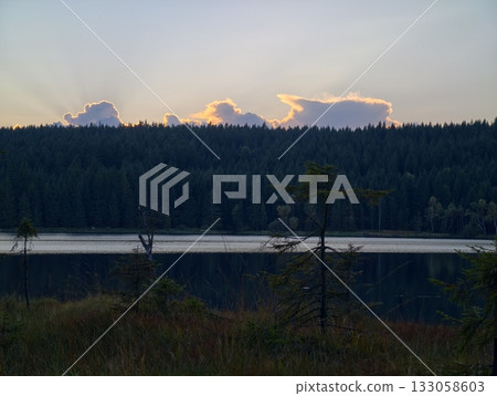 calm horizon bathed in sunset glow, peaceful landscape featuring colorful sky and tranquil lake calm horizon bathed in sunset glow, peaceful landscape featuring colorful sky and tranquil lake 133058603