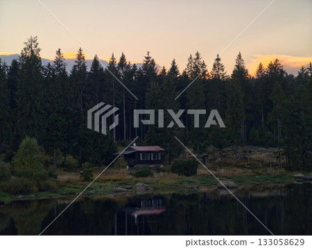 serene cabin with pine forest reflection, intimate lakeshore cabin glowing among dense pines serene cabin with pine forest reflection, intimate lakeshore cabin glowing among dense pines 133058629