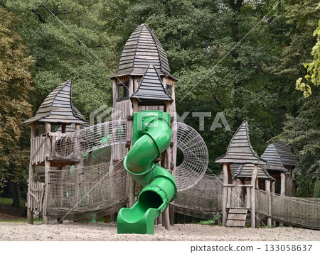 outdoor area with castle towers, exterior play zone with turrets resembling wooden castle structure 133058637