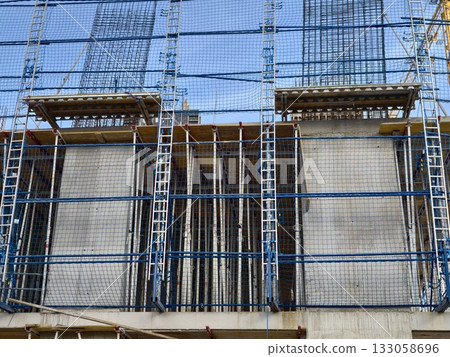 inspection of support structures and connecting clamps in construction formwork setups for walls 133058696