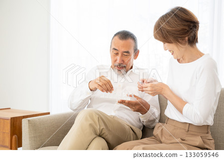 Senior men who take medicine Senior men who take medicine 133059546