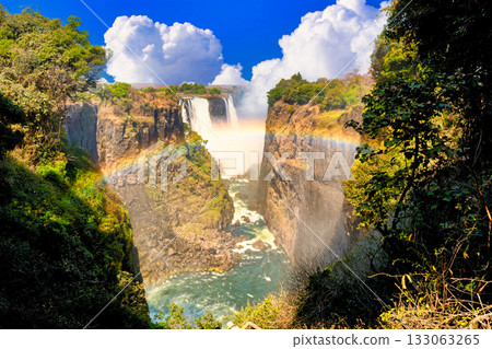 A rainbow over Victoria Falls, a World Heritage Site A rainbow over Victoria Falls, a World Heritage Site 133063265