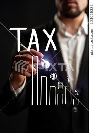 Businessman illustrating tax growth with data visualization on dark background Businessman illustrating tax growth with data visualization on dark background 133066328