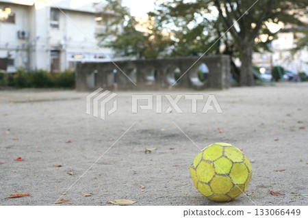 Soccer ball forgotten in the park 133066449