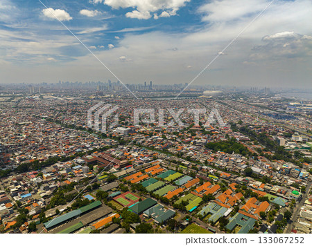 Slums and skyscrapers in Jakarta. City Landscape. Indonesia. 133067252