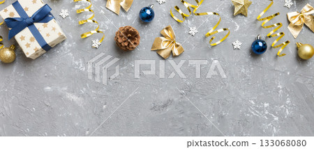 New Year composition. Christmas decor background with pine cones. Top view with copy space New Year composition. Christmas decor background with pine cones. Top view with copy space 133068080