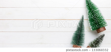 Flat lay composition with christmas trees on color background. Top view with copy space 133068332
