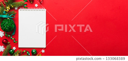 Christmas blank greeting card mock-up scene. Creative layout made of Christmas tree branches and paper card note. Flat lay. Nature New Year concept Christmas blank greeting card mock-up scene. Creative layout made of Christmas tree branches and paper card note. Flat lay. Nature New Year concept 133068389