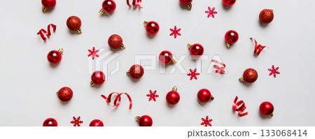 Christmas composition. a pattern of christmas balls on colored background. Flat lay, top view New year decor Christmas composition. a pattern of christmas balls on colored background. Flat lay, top view New year decor 133068414