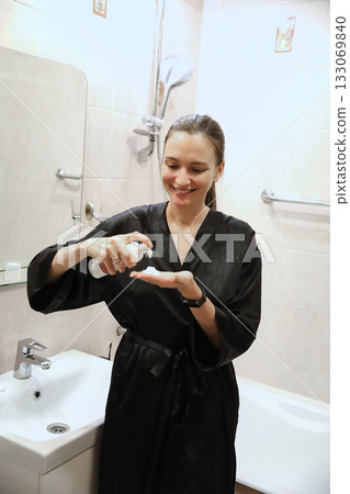 Woman Applying Face Cream, Bathroom Routine 133069840