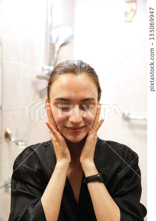 Woman Applying Face Cream, Bathroom Routine 133069947