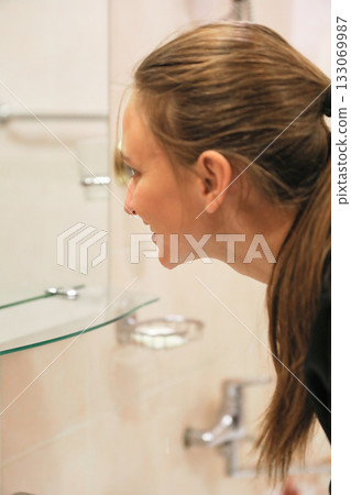 Woman's Morning Routine in Bathroom 133069987