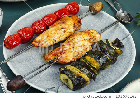 Grilled chicken skewers. Grilled chicken skewers. 133070162