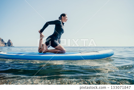 Yoga Paddle Board Woman Exercise Water Ocean Beach Yoga Paddle Board Woman Exercise Water Ocean Beach 133071847