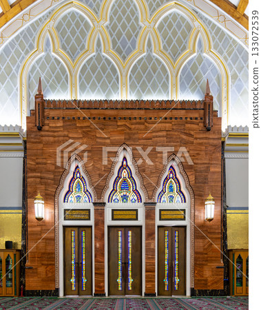 Omar Ali Saifuddien Mosque, Bandar Seri Begawan, Brunei Darussalam. Ornate interior with stained glass and wooden doors Omar Ali Saifuddien Mosque, Bandar Seri Begawan, Brunei Darussalam. Ornate interior with stained glass and wooden doors 133072539