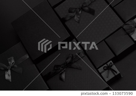 Elegant Black Gift Boxes. Black Friday background Elegant Black Gift Boxes. Black Friday background 133073590