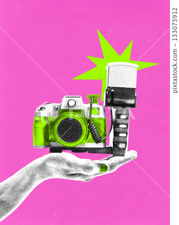 Pop art collage. Retro camera with flash balanced on hand in vibrant photocopy style. Pop art collage. Retro camera with flash balanced on hand in vibrant photocopy style. 133073912