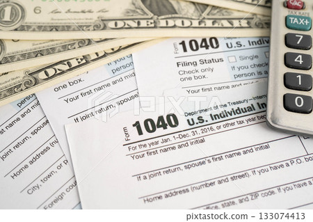 Tax form 1040 U.S. Individual Income Tax Return and bitcoin, business finance, Digital currency, Virtual cryptocurrency. Tax form 1040 U.S. Individual Income Tax Return and bitcoin, business finance, Digital currency, Virtual cryptocurrency. 133074413