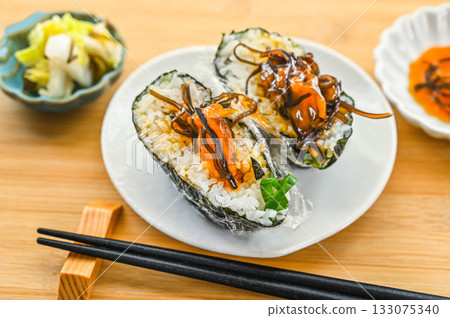 Onigirazu rice balls with egg yolk marinated in salted kelp 133075340