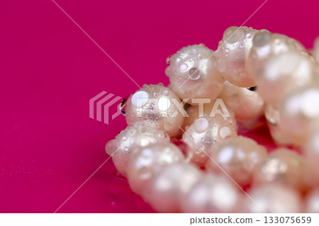 wet natural irregular shaped pearls from a marine mollusk covered with water droplets used in the manufacture of women's jewelry beads wet natural irregular shaped pearls from a marine mollusk covered with water droplets used in the manufacture of women's jewelry beads 133075659
