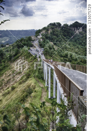 Panoramic View of Civita di Bagnoregio Access Bridge and Lush Panoramic View of Civita di Bagnoregio Access Bridge and Lush 133075729