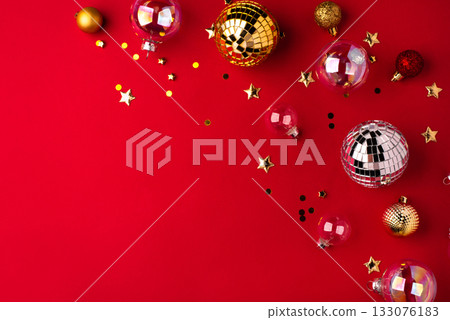 Christmas ornaments on a red background. 133076183